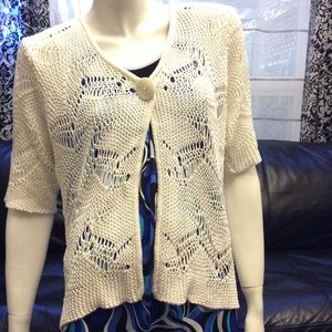 Flirty crocheted short sleeved sweater